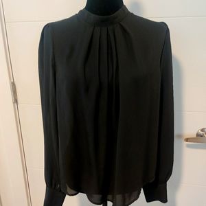 Black pleated blouse